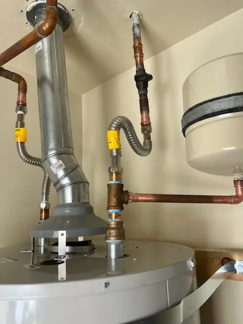 Water heater installation and plumbing repair in Braun Station East